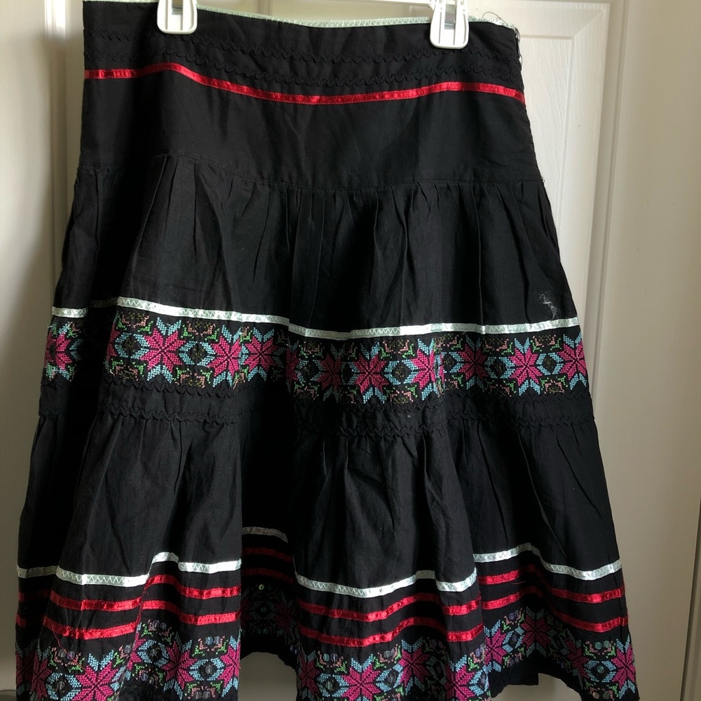 Anthropologie black skirt with embroidered designs
